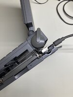 Powerbook 140 laying on its side, display open