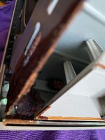 rusted flakey metal and battery.jpg