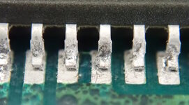 Tiny-chip-pins-may-look-connected-when-viewed-from-above.jpg Tiny-chip-pins-may-look-connected-when-viewed-from-above.jpg